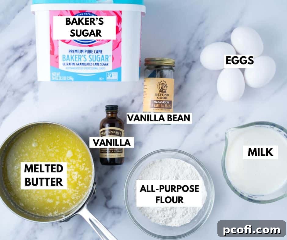 Assorted ingredients for magic custard cake laid out on a table, including eggs, milk, flour, sugar, butter, and vanilla bean