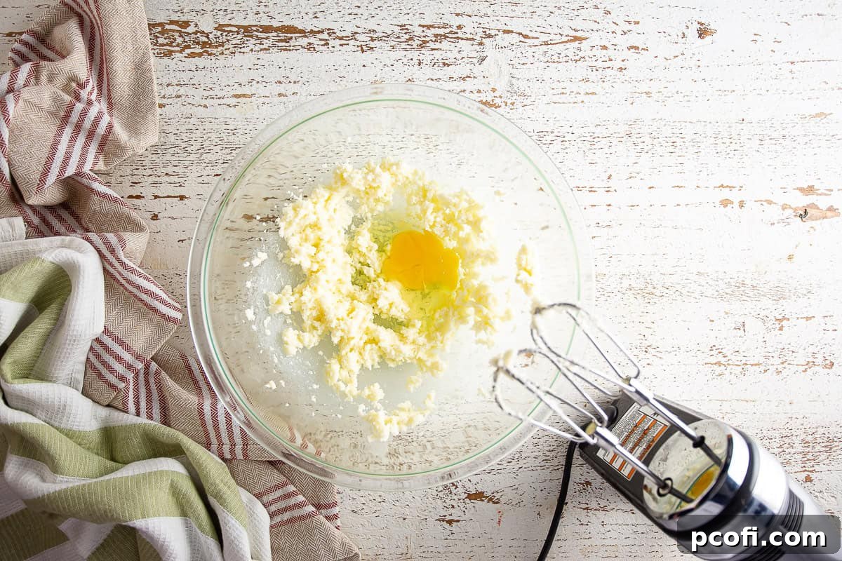 One egg added to the creamed butter and sugar mixture for the pear tart filling.