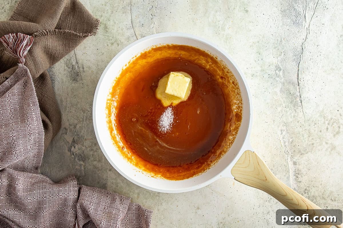 Sticky toffee sauce after cream and butter have been added, creating a smooth, rich consistency.