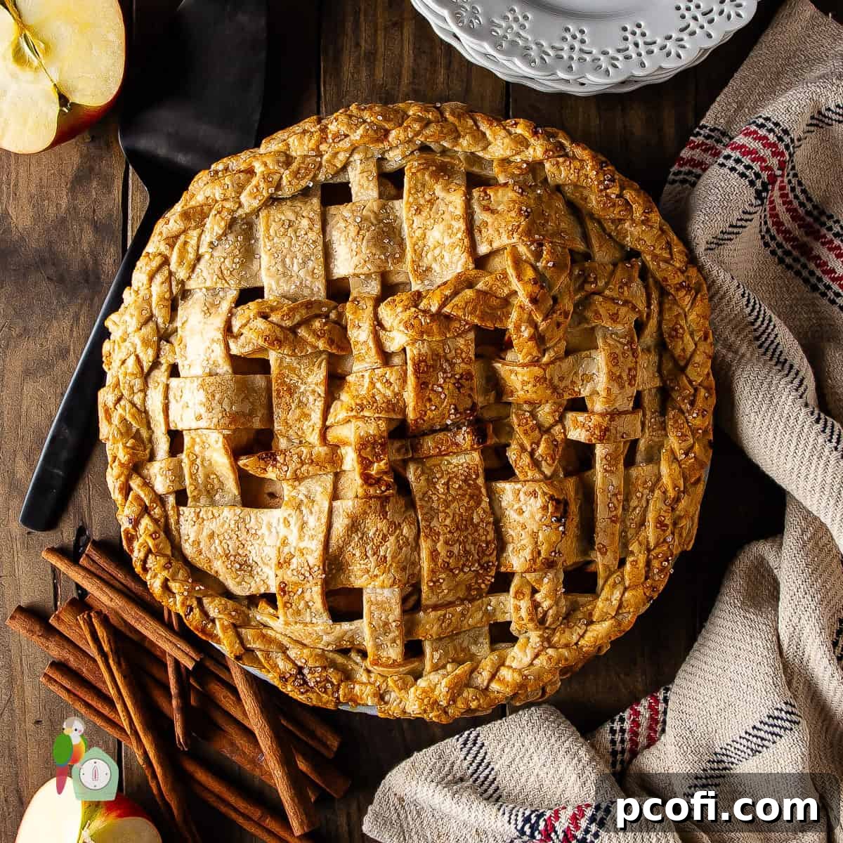 Classic apple pie with a beautiful lattice top, ready to be served.