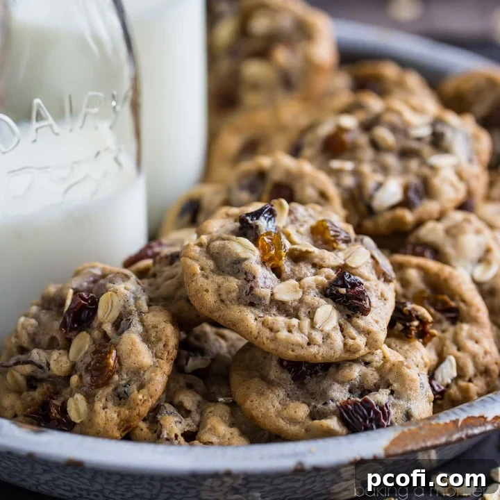 Irresistibly soft and chewy oatmeal raisin cookies, generously filled with plump, sweet raisins and warm cinnamon.