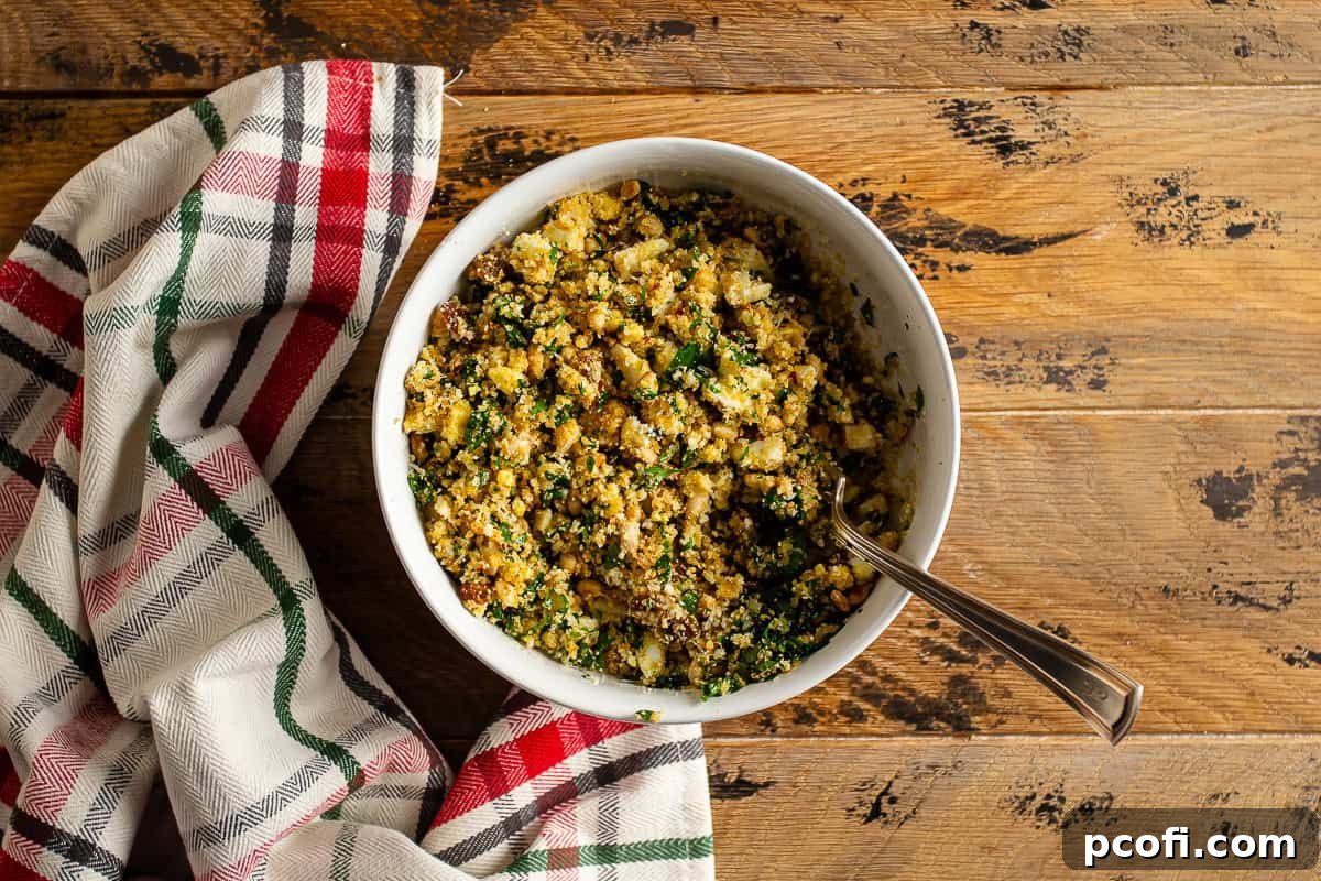Mixed Braciole filling in a white bowl, ready for spreading on beef.