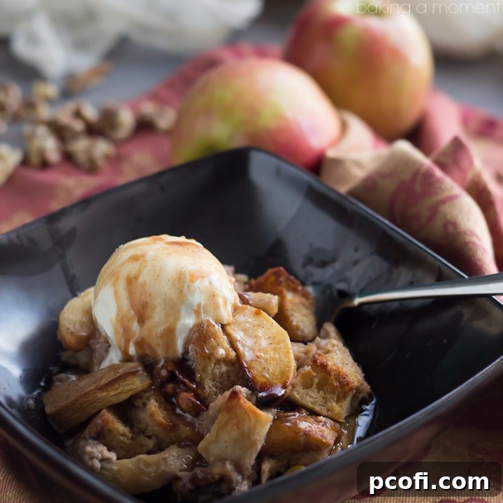A warm, inviting Apple Walnut Bread Pudding, generously drizzled with a rich Cinnamon Cider Sauce, perfect for a comforting fall dessert.