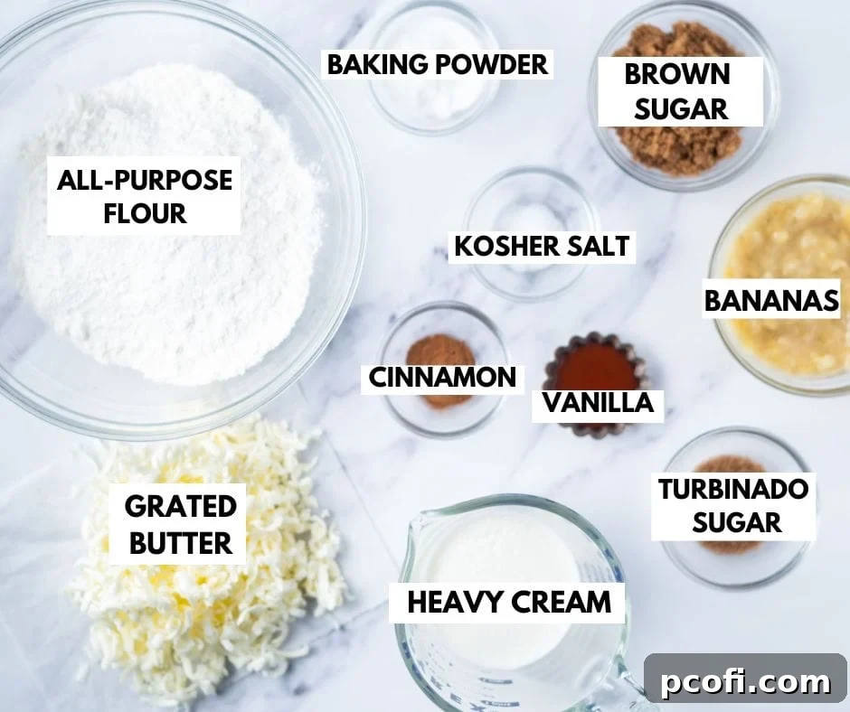 Key ingredients laid out for making delicious banana scones, including flour, butter, ripe bananas, sugars, and spices.