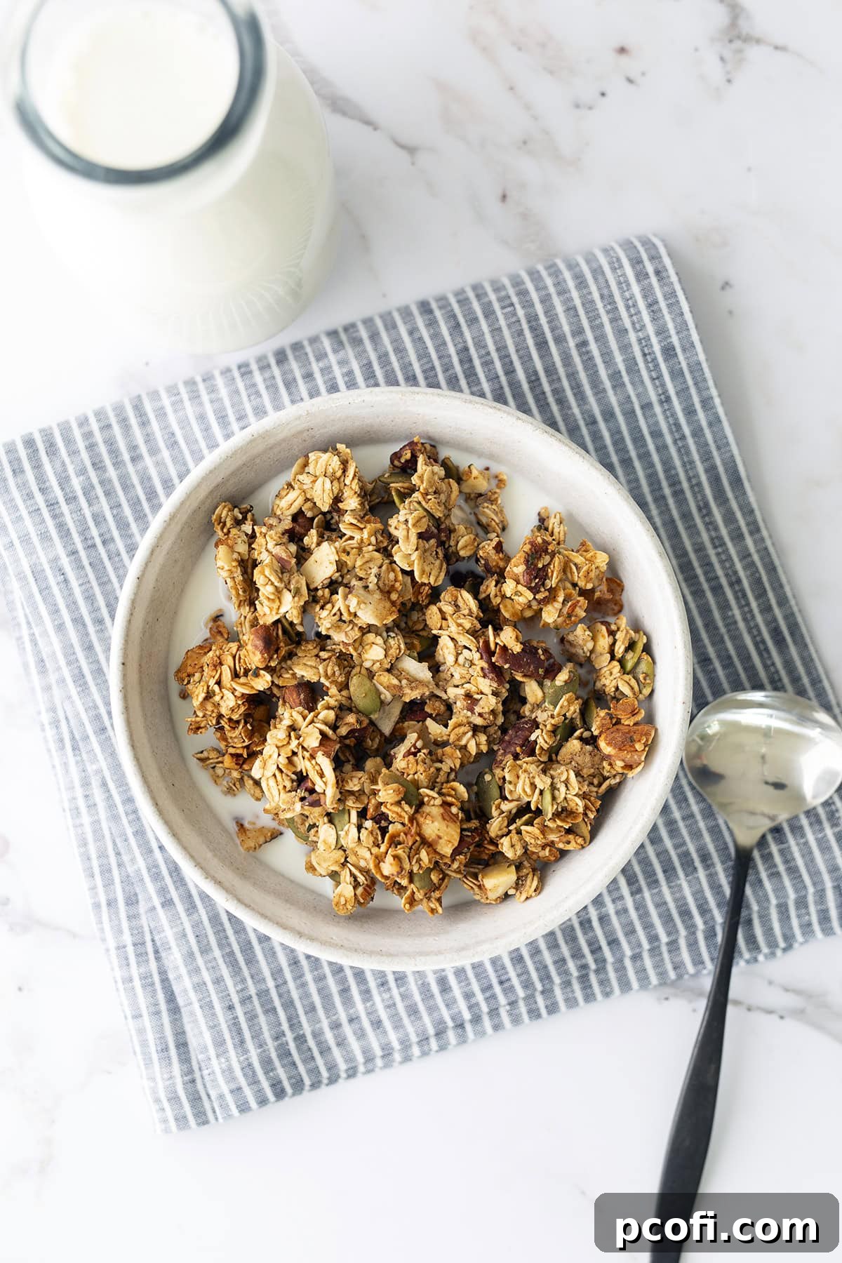 Protein granola in a bowl with milk