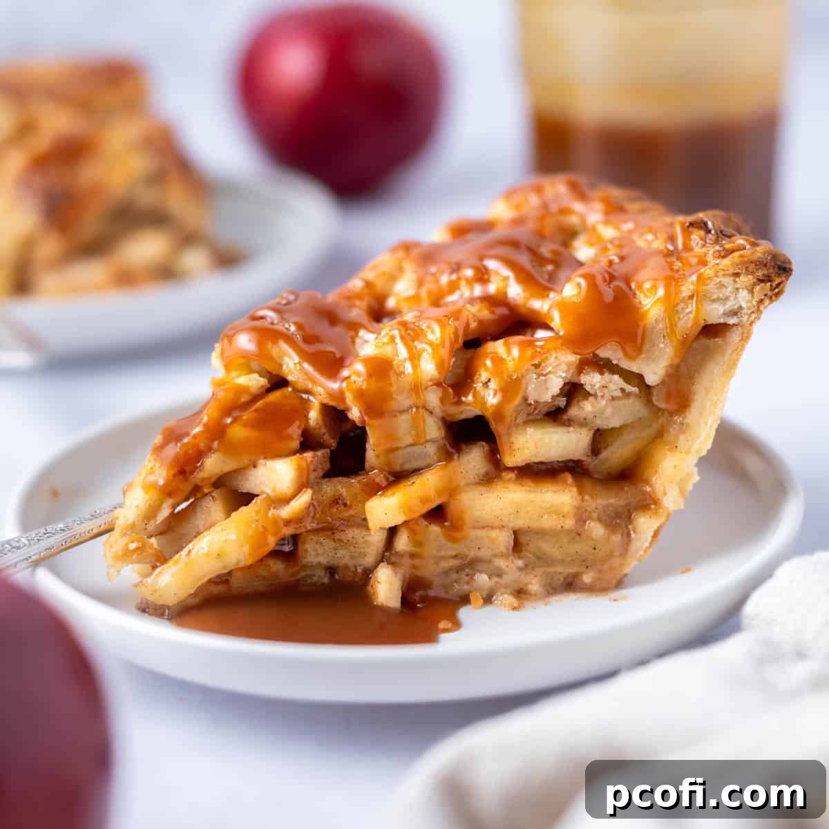 slice of pie with caramel sauce on a plate