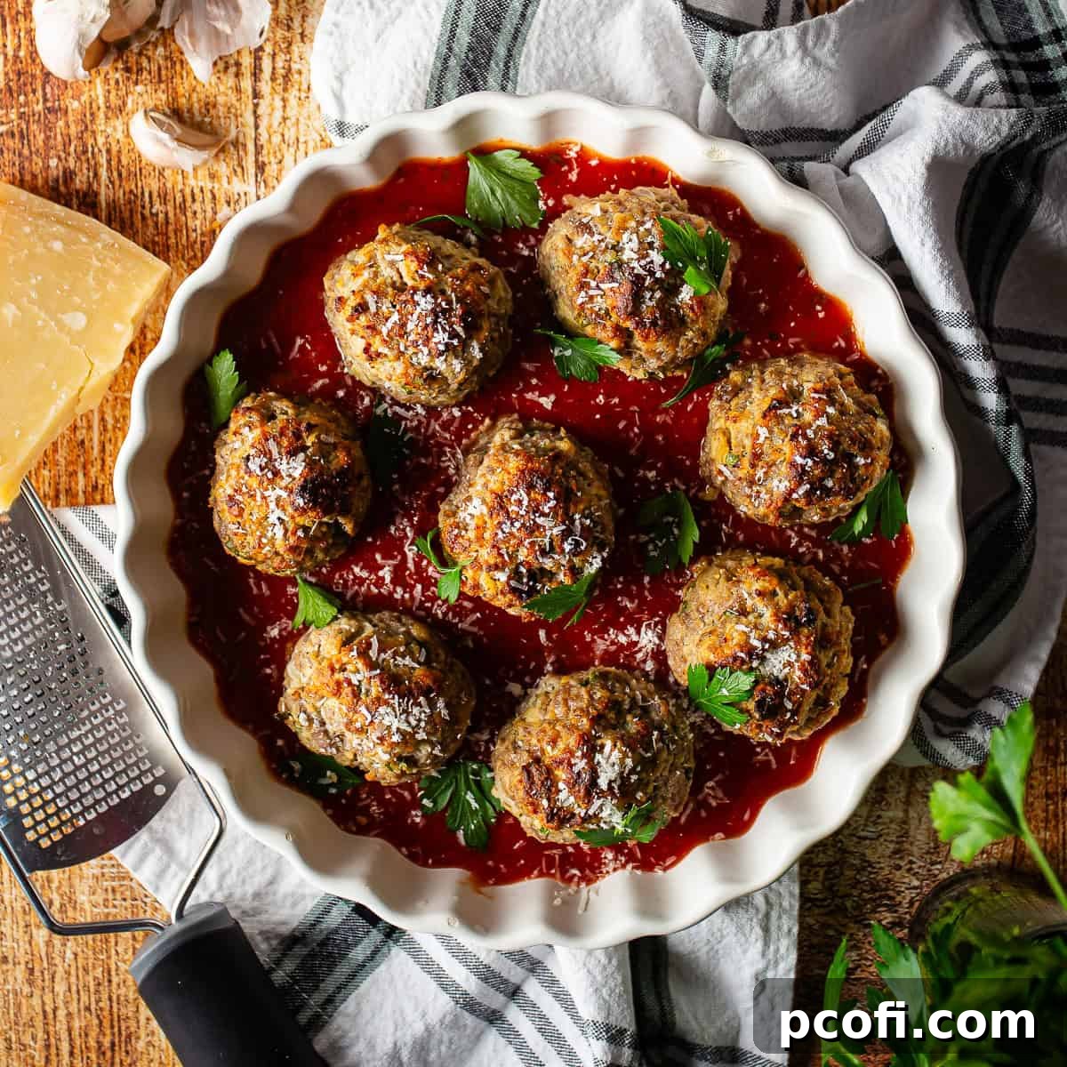 A versatile batch of homemade meatballs, ready for various culinary preparations.
