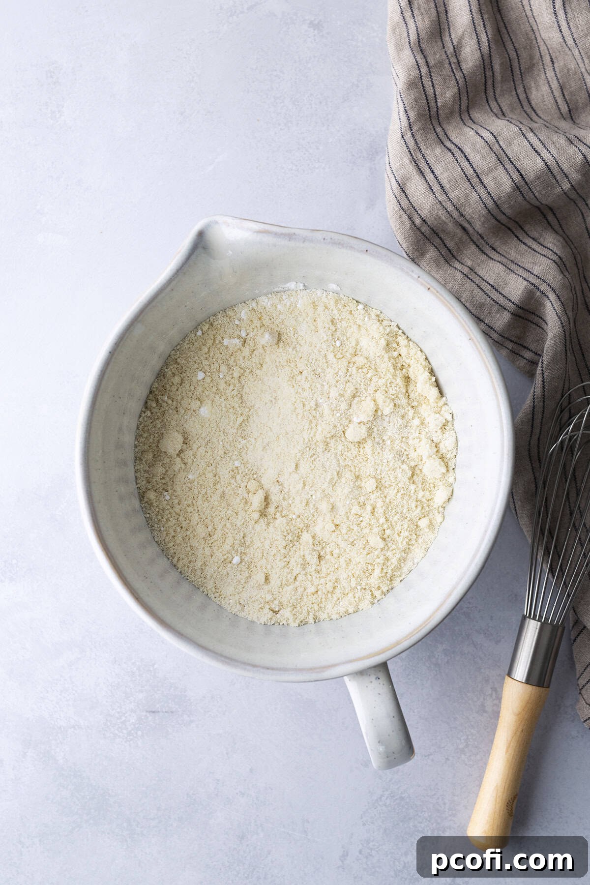 Dry ingredients in bowl for Amaretti cookies.