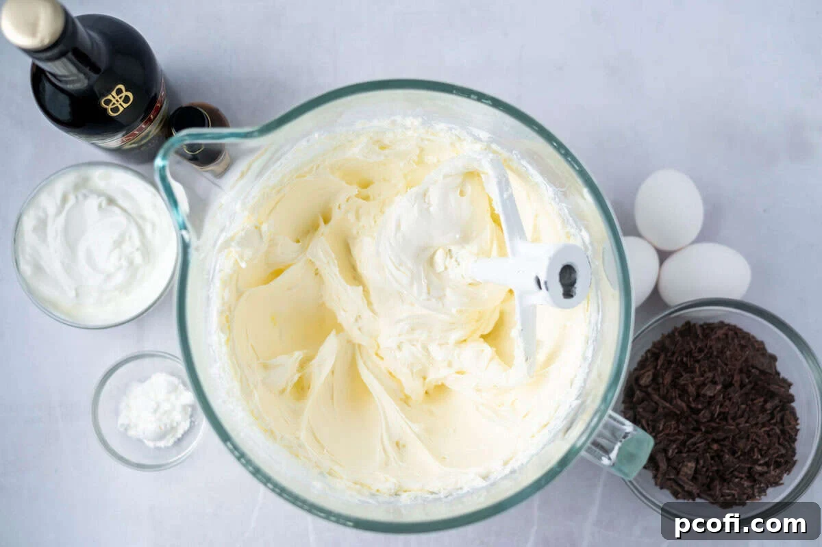 Cream cheese and granulated sugar beaten together until smooth and creamy in a mixing bowl.