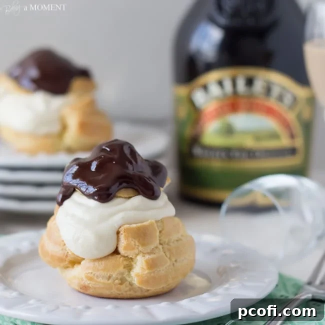 Delicate Irish Cream Profiteroles filled with Bailey's mousse and dark chocolate ganache.