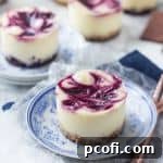 Lemon Berry Swirl Mini Cheesecakes recipe image
