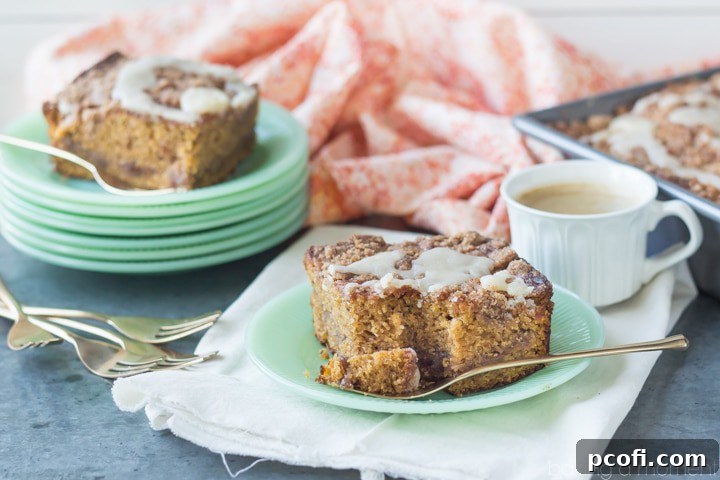 Close-up of Buttered Rum & Candied Sweet Potato Crumb Cake showing crumb topping