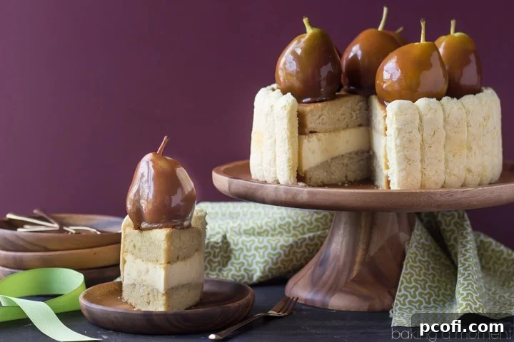 Artfully arranged ladyfingers enclosing the Caramel Pear Charlotte, ready for its final garnish.