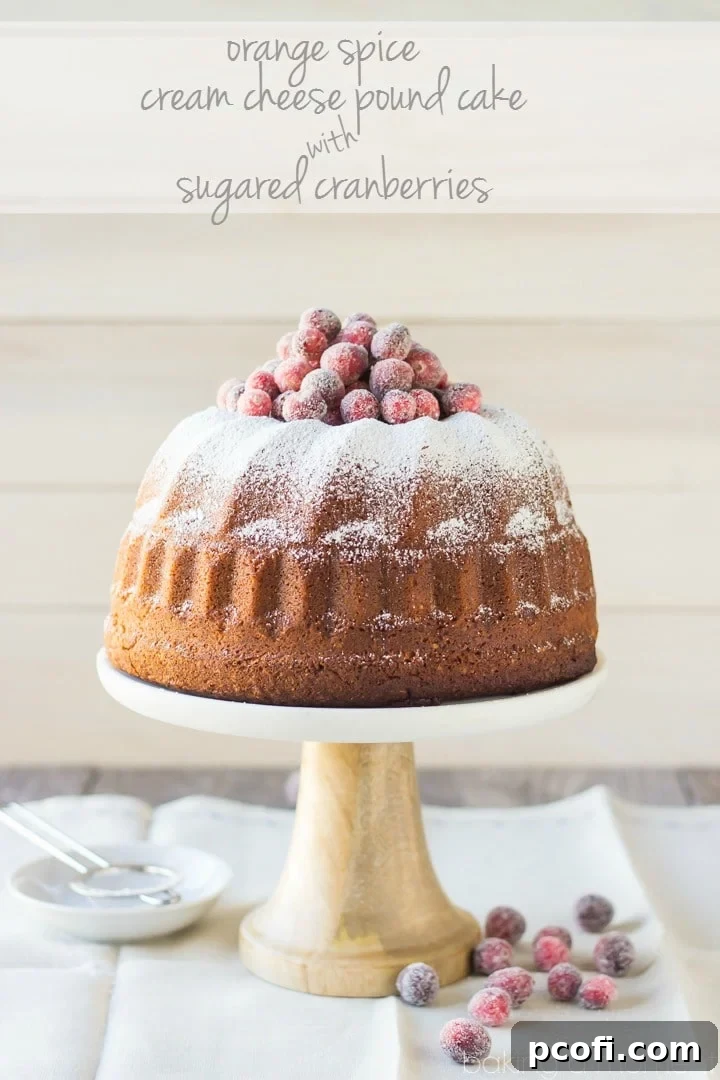 Close-up of velvety cream cheese pound cake with orange zest, perfect for the holidays, showing its moist texture.