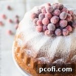 Orange Spice Cream Cheese Bundt Cake with Sugared Cranberries