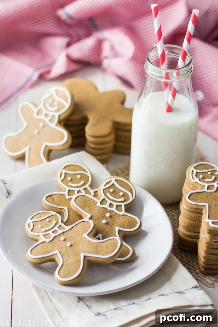 A festive array of decorated gingerbread cookies, showcasing their perfect shapes and vibrant icing.