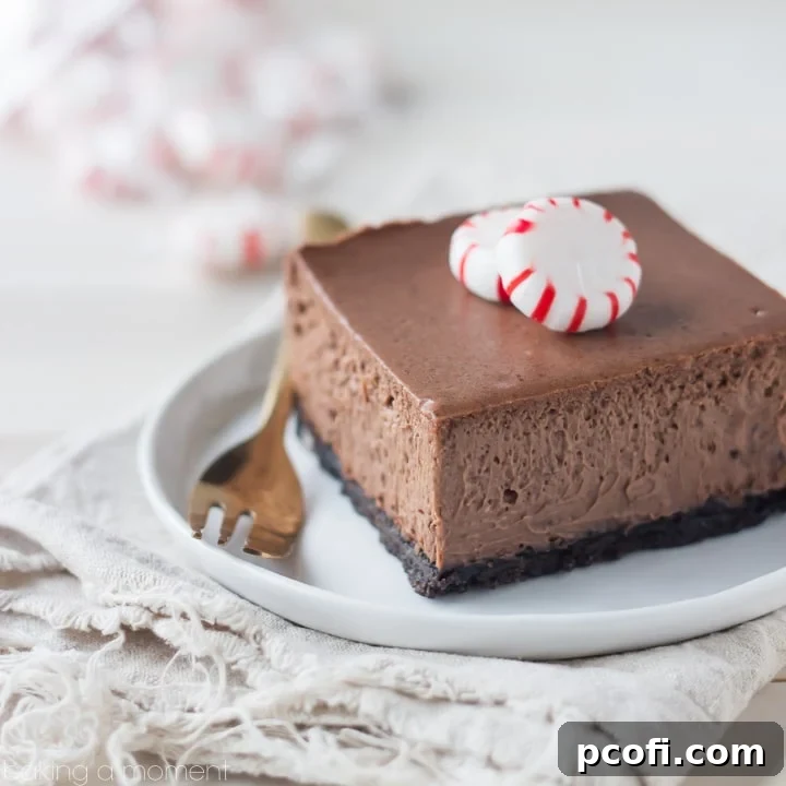 Delicious Chocolate Peppermint Cheesecake Bars, perfect for Christmas. Features creamy chocolate and a cool peppermint kick.