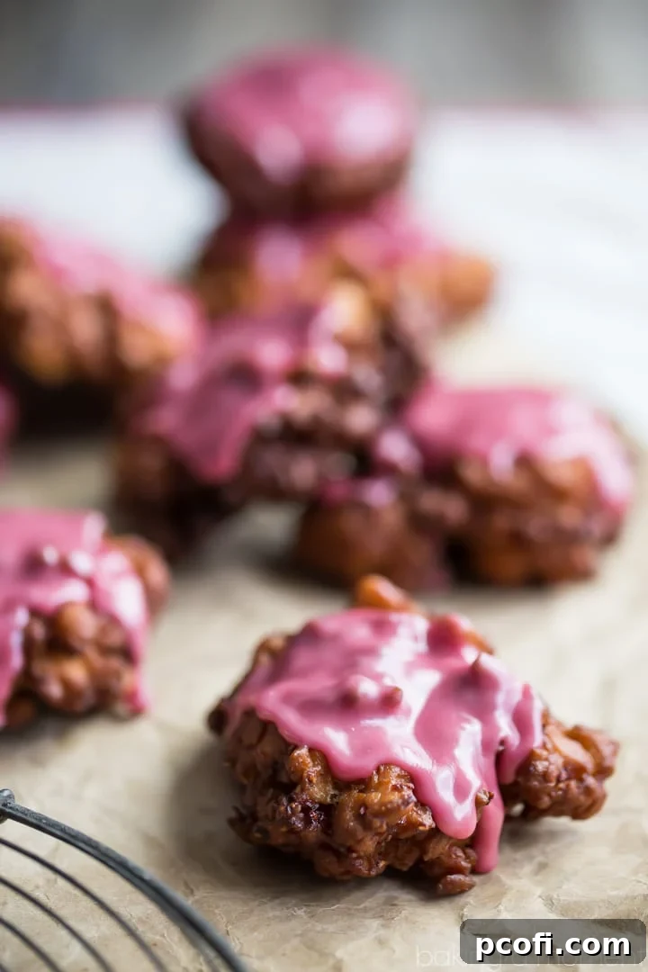 How to make fritters: I used raspberry jam in the dough and the glaze and they were amazing! Freshly fried fritters draining on paper towels.