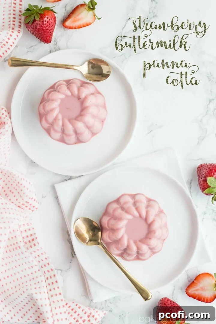 A close-up of Strawberry Buttermilk Panna Cotta, showcasing its creamy texture and vibrant color.
