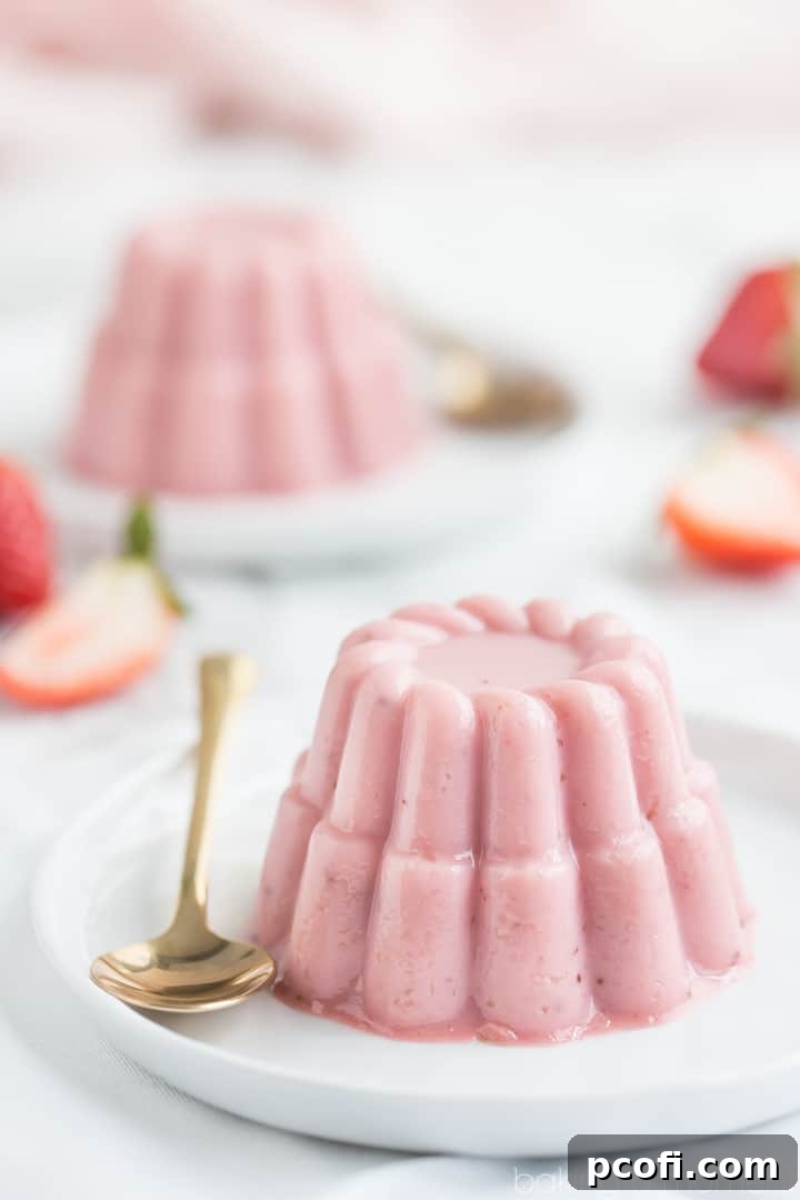 Strawberry Buttermilk Panna Cotta served in elegant glasses, ready to be enjoyed on a summer evening.