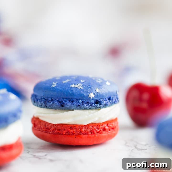 Red, White, and Blue Cherry Cheesecake Macarons, perfect for patriotic celebrations. These delicate cookies are a must-make for Memorial Day or July 4th gatherings.
