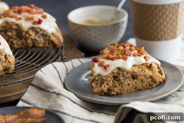 A duo of cinnamon peanut butter chip scones with maple bacon glaze and coffee, arranged for a perfect breakfast or brunch.