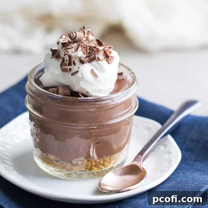 Easy Homemade Chocolate Pudding Pie Jars - a rich, smooth, chocolatey dessert with a crisp graham cracker crust and whipped cream topping.