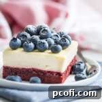 Fourth of July Red Velvet Cheesecake Bars with blueberries.