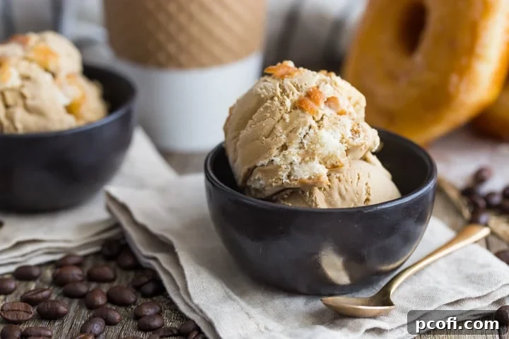 Scoops of Coffee and Donuts Ice Cream in a bowl, ready to be enjoyed.