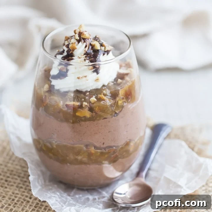 Fluffy German Chocolate Cheesecake Mousse layered with rich coconut pecan caramel