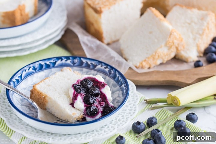 Classic Angel Food Cake: perfectly sweet & light as a cloud, served with fresh whipped cream and a citrus-y blueberry lemongrass topping. 
