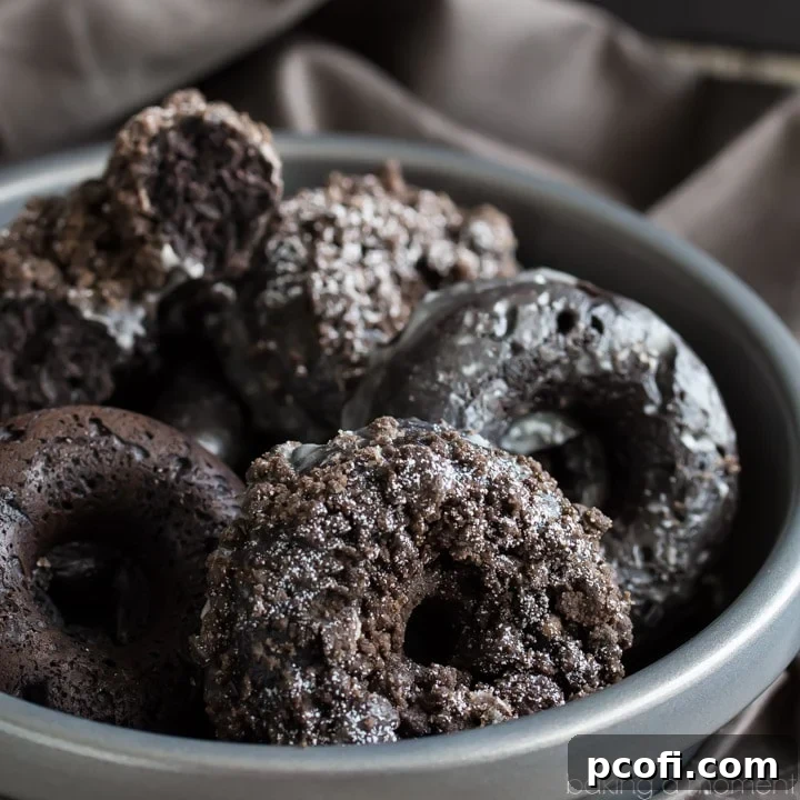 Baked Chocolate Crumb Donuts: The most chocolate-y cake donuts ever, featuring a delectable crumb topping and rich vanilla glaze. Perfect for breakfast or brunch!