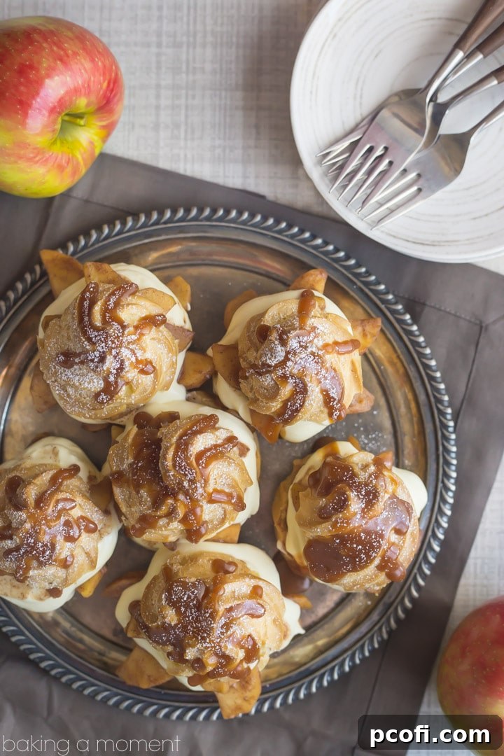 Caramel Apple Cream Puffs arranged on a serving platter, highlighting the golden brown, perfectly puffed choux pastry, ready to be devoured.