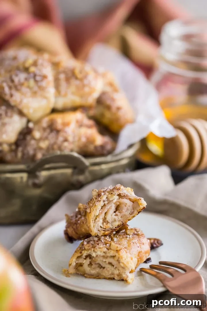 Apple Honey Rugelach: tender cream cheese pastries filled with charoset- an apple/honey/walnut mixture that's perfect for Rosh Hashana or any other fall occasion!