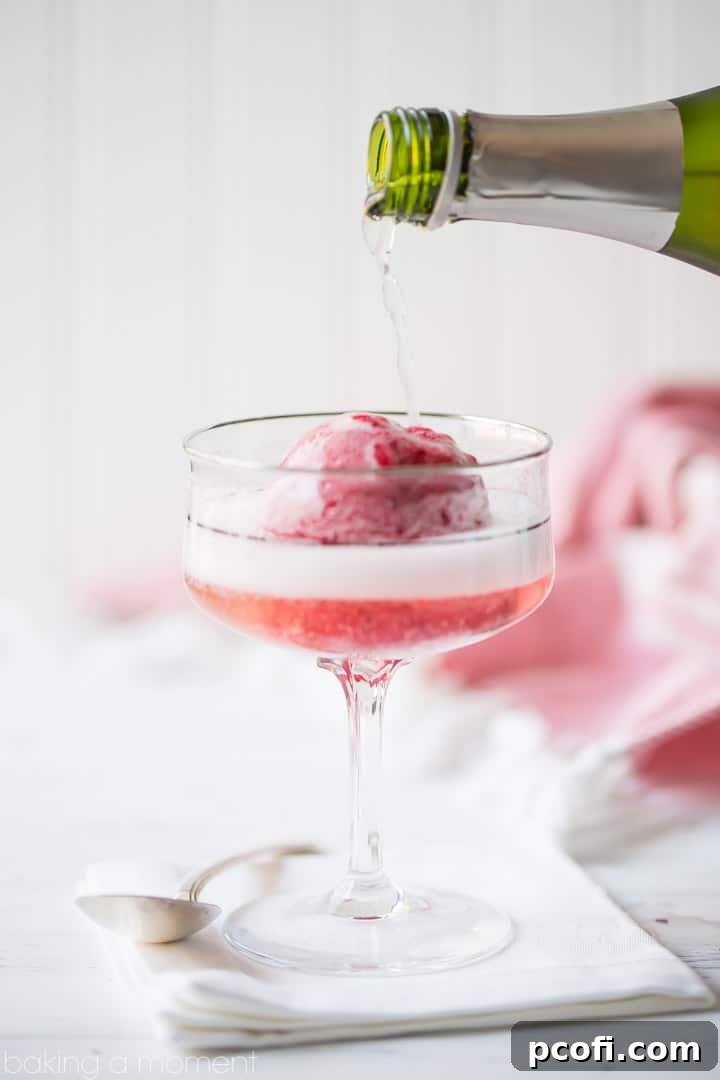 Several Cranberry Sorbet Champagne Floats arranged elegantly on a table, ready for guests.