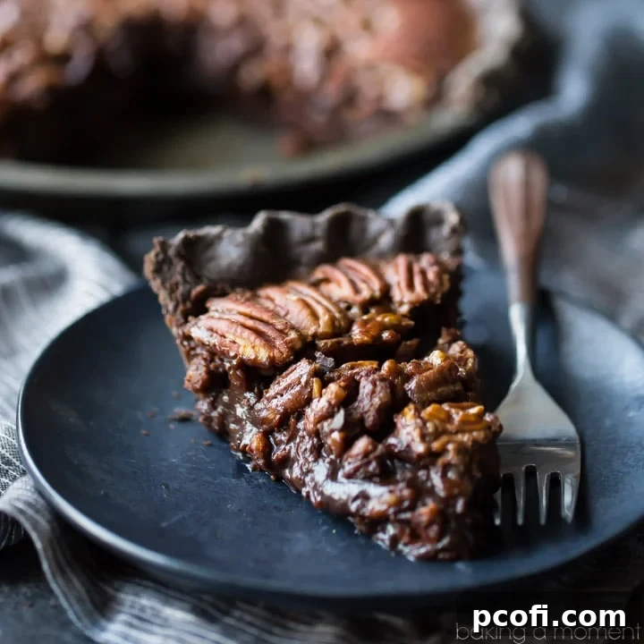 Double Chocolate Pecan Pie with a rich chocolate crust and a sweet, sticky chocolate pecan filling. Made with no corn syrup, perfect for dessert lovers and holiday tables.