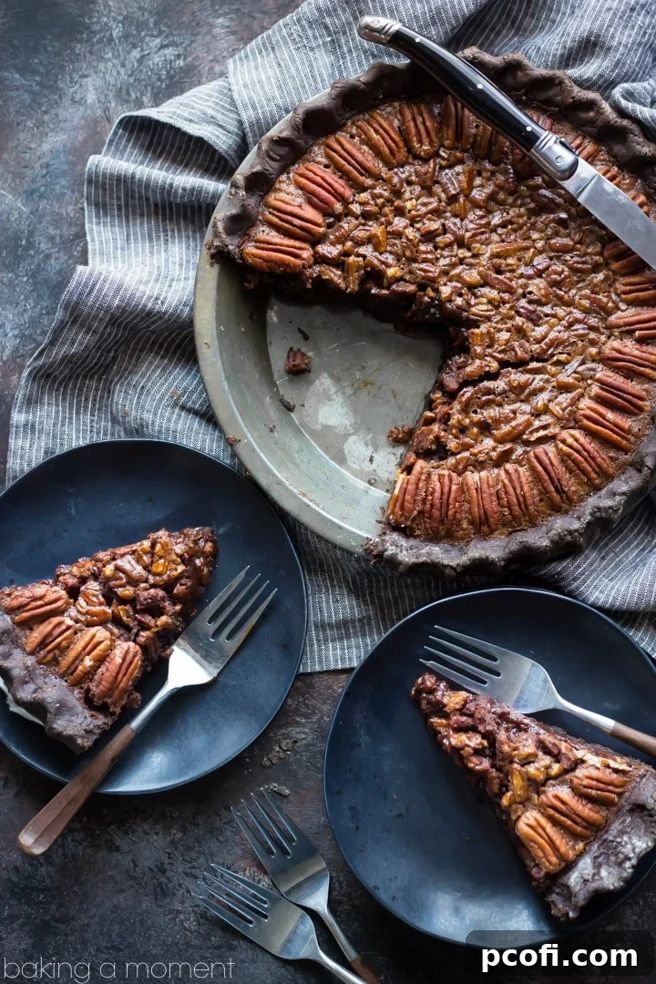 An overhead view of a Double Chocolate Pecan Pie, showcasing its golden-brown crust, rich filling, and beautifully arranged pecan halves. A perfect homemade dessert.