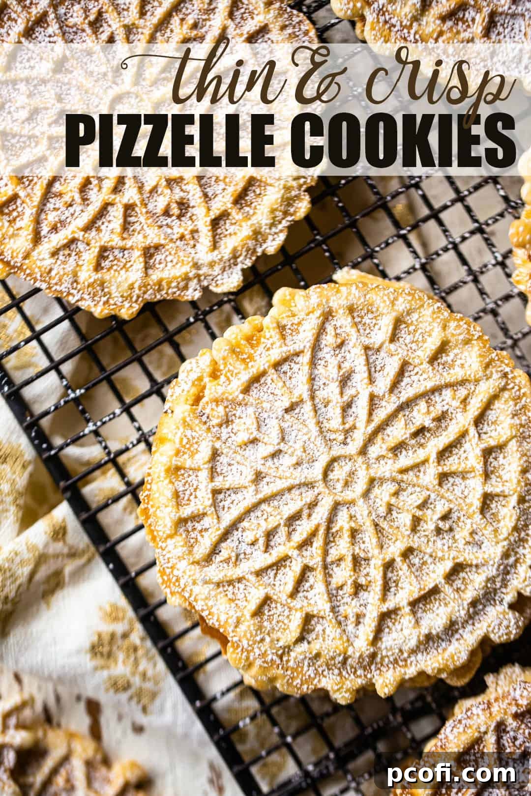 Perfect pizzelle recipe, prepared and arranged on a wire rack, with a text overlay above that reads "Thin & Crisp Pizzelle Cookies."