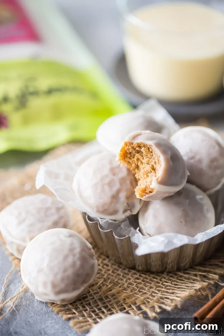Close-up of fluffy, whole-grain, and gluten-free Baked Cinnamon Eggnog Donut Holes, highlighting their perfect texture.