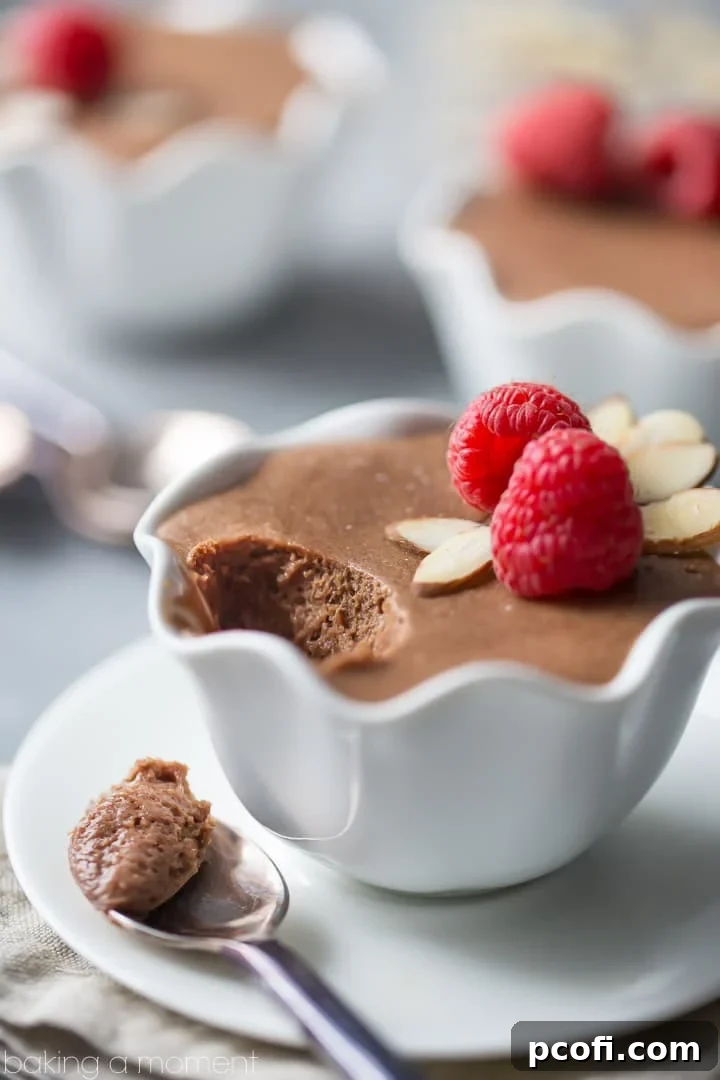 Close-up of a beautifully set Chocolate Amaretto Mousse in a serving dish, garnished and ready to enjoy.