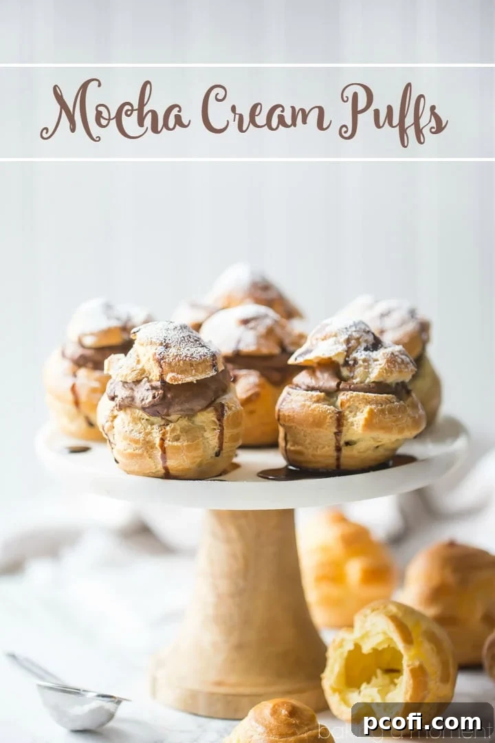 Close-up of a filled Mocha Cream Puff, showcasing the perfectly puffed choux and the creamy chocolate-espresso filling inside.