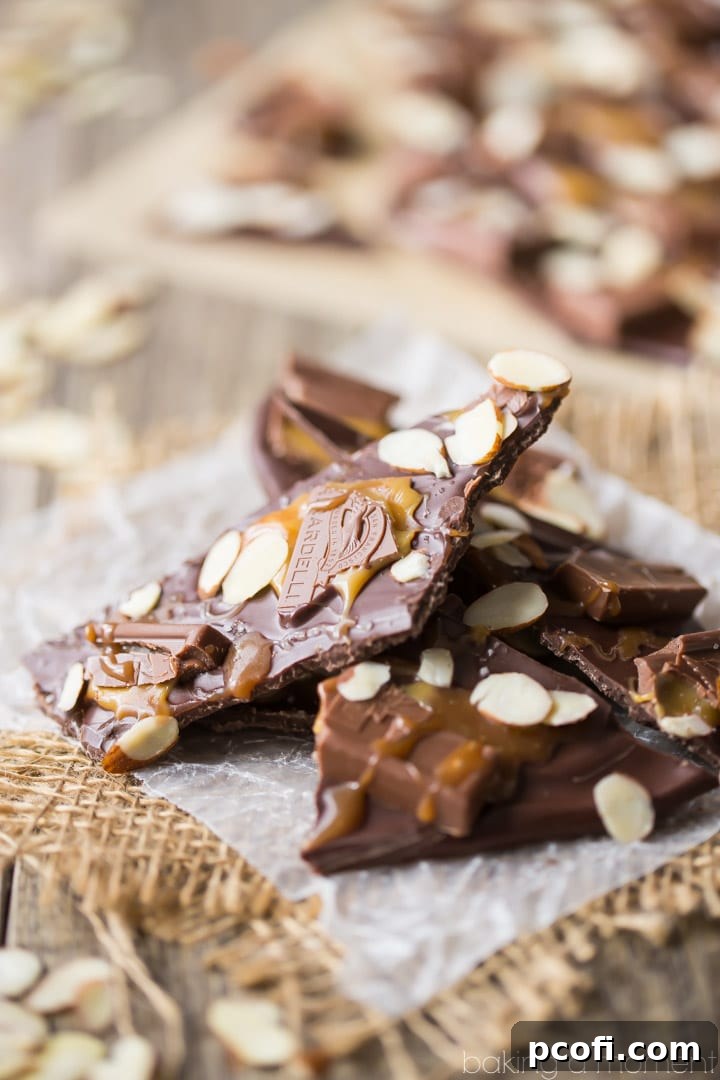 Chocolate Bark- one of the easiest and most fun homemade candy recipes! This almond, caramel and sea salt version is a family favorite, made with Ghirardelli chocolate. food desserts chocolate
