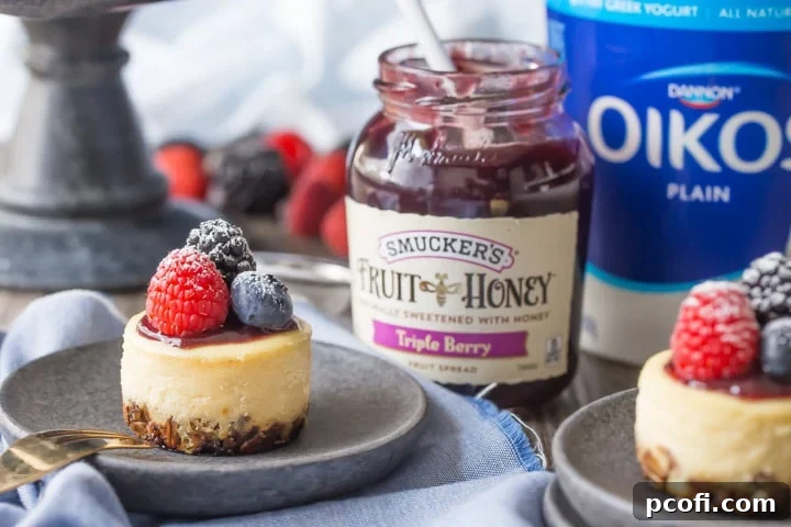 Triple Berry Honey Yogurt Breakfast Cheesecakes: these have a whole grain granola crust, and are sweetened with honey and made with Greek yogurt, so they're a perfect make-ahead, grab & go breakfast! food breakfast yogurt