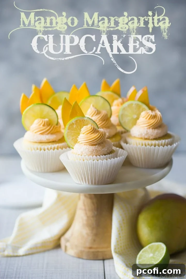 Mango Margarita Cupcakes: The flavors are exquisite, mirroring a perfect mango margarita with sweet mango, fresh lime, and a boozy hint of tequila. A delicious food dessert cupcake.