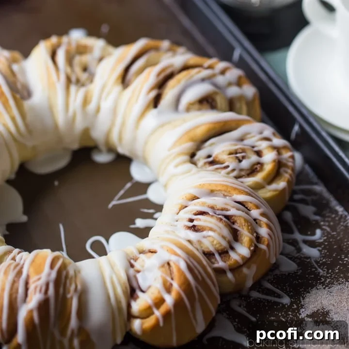 Swedish Tea Ring: a wreath-shaped cinnamon roll loaf drizzled with confectioners' glaze. Perfect for breakfast or brunch.