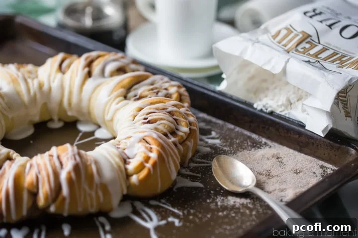 Swedish Tea Ring: a wreath-shaped cinnamon roll loaf drizzled with confectioners' glaze. Perfect for breakfast or brunch.
