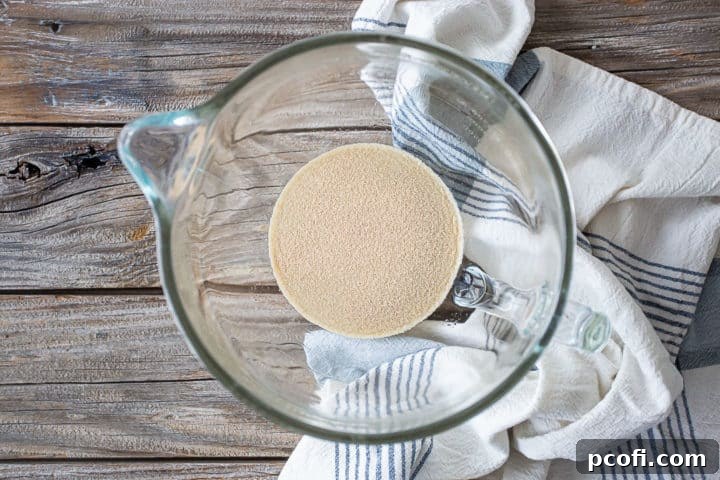 Dissolving yeast in warm water.