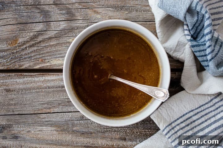Sticky bun topping in a small white bowl.