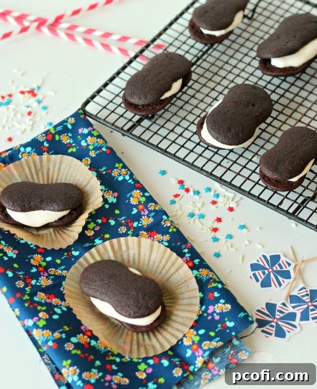 Stack of homemade chocolate malt devil dogs on a cooling rack
