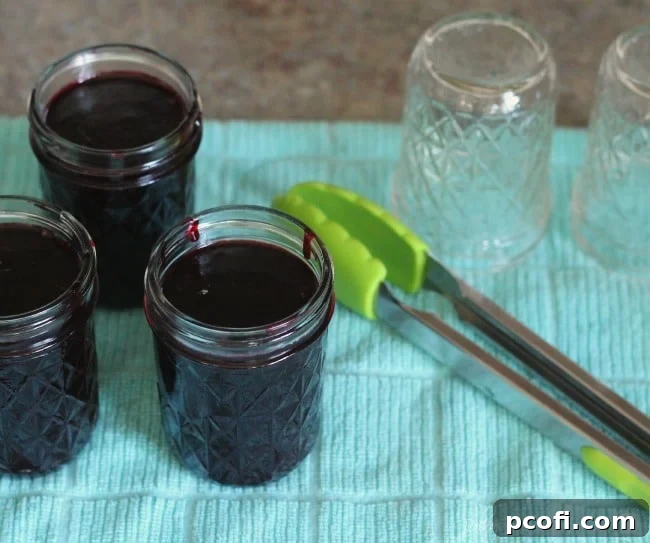 Hot Blackberry Jam in Sterilized Jars